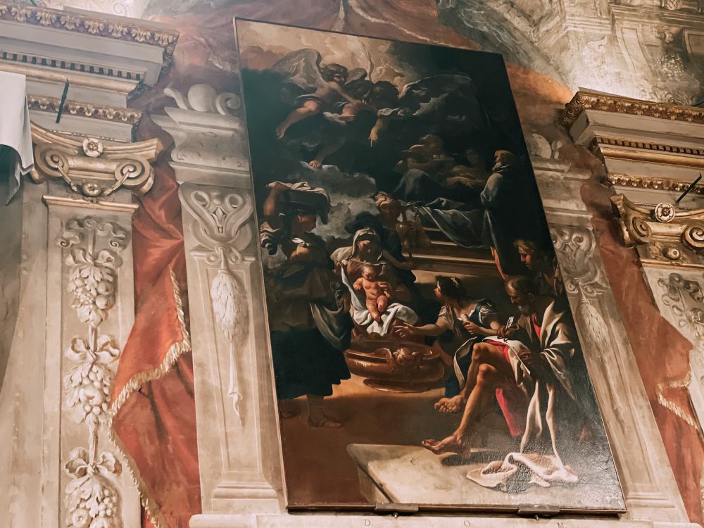 la Pala d'altare della Nascita del Battista nell'Oratorio dei Fiorentini a Bologna